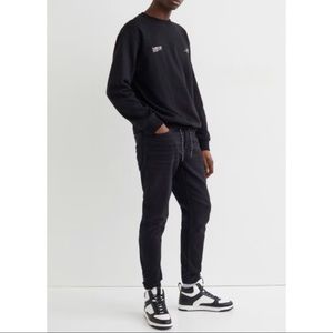 Men’s Black joggers in stretch denim (M).